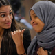 Rep.-elect Alexandria Ocasio-Cortez, D-NY., chats with Rep.-elect IIhan Omar, D-Minn., en route to member-elect briefings in Washington on November 15.